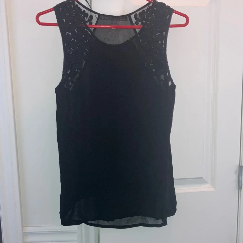 Black sheer lined top with embroidered details - Picture 1 of 7
